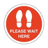 Please Wait Here Floor Sticker - Red | Safety-Label.co.uk