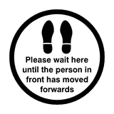 Please Wait Until Person In Front Has Moved Floor Sticker - Black | Safety-Label.co.uk